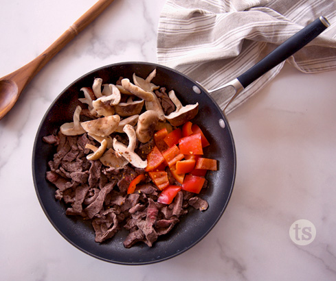 overhead of skillet with veggies