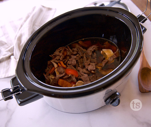 overhead of slow cooker with broth