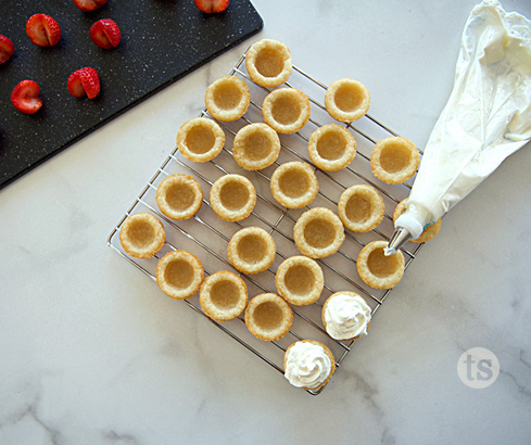 cookie cups filled with frosting