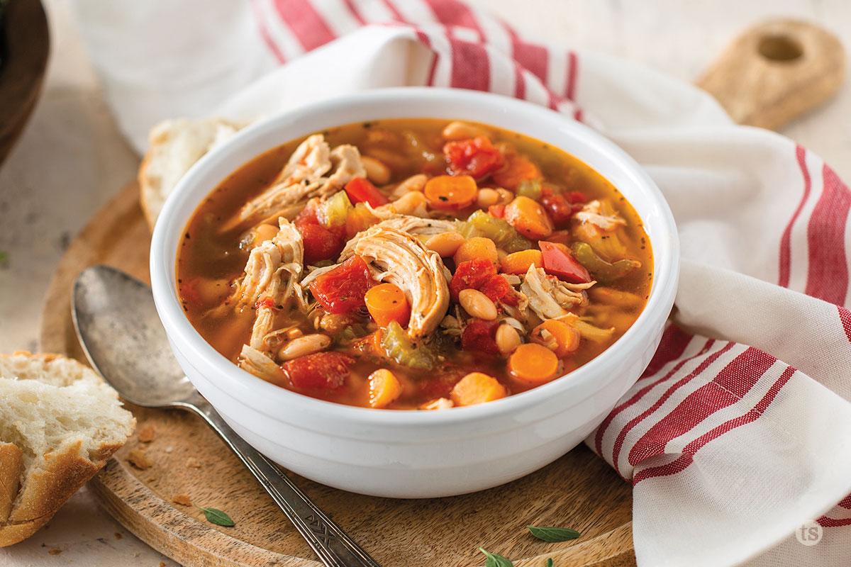 Bowl of soup with chicken and veggies