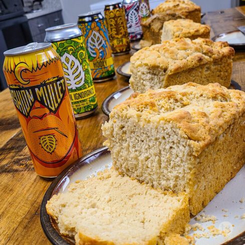 Sliced Bountiful Beer Bread with multiple Lupulin Brewing flavors of beer