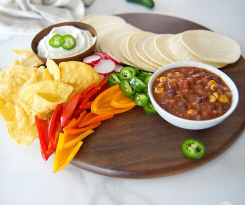 charcuterie board with fresh peppers